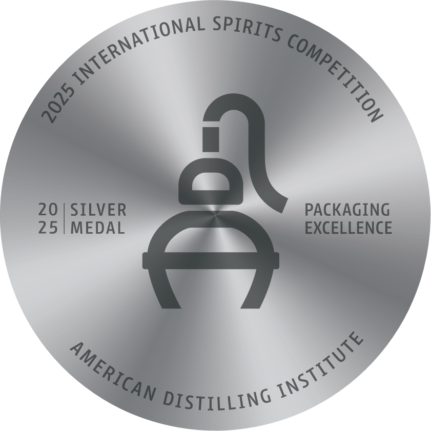 Design of a label or award plaque featuring a stylized bottle in the center, with text around the edges indicating it is from the 2025 International Spirits Competition, awarded a Silver Medal in 2025 by the American Distilling Institute for packaging excellence.