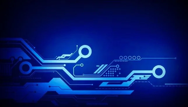 Futuristic digital circuit board with glowing blue lines and nodes on dark background.