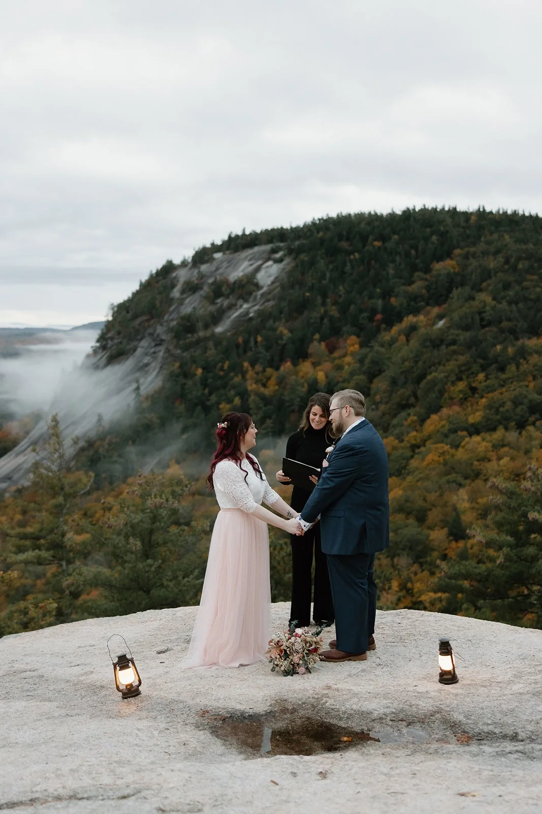 Wedding officiant leading Hope and Josh’s elopement ceremony at Cathedral Ledge in New Hampshire
