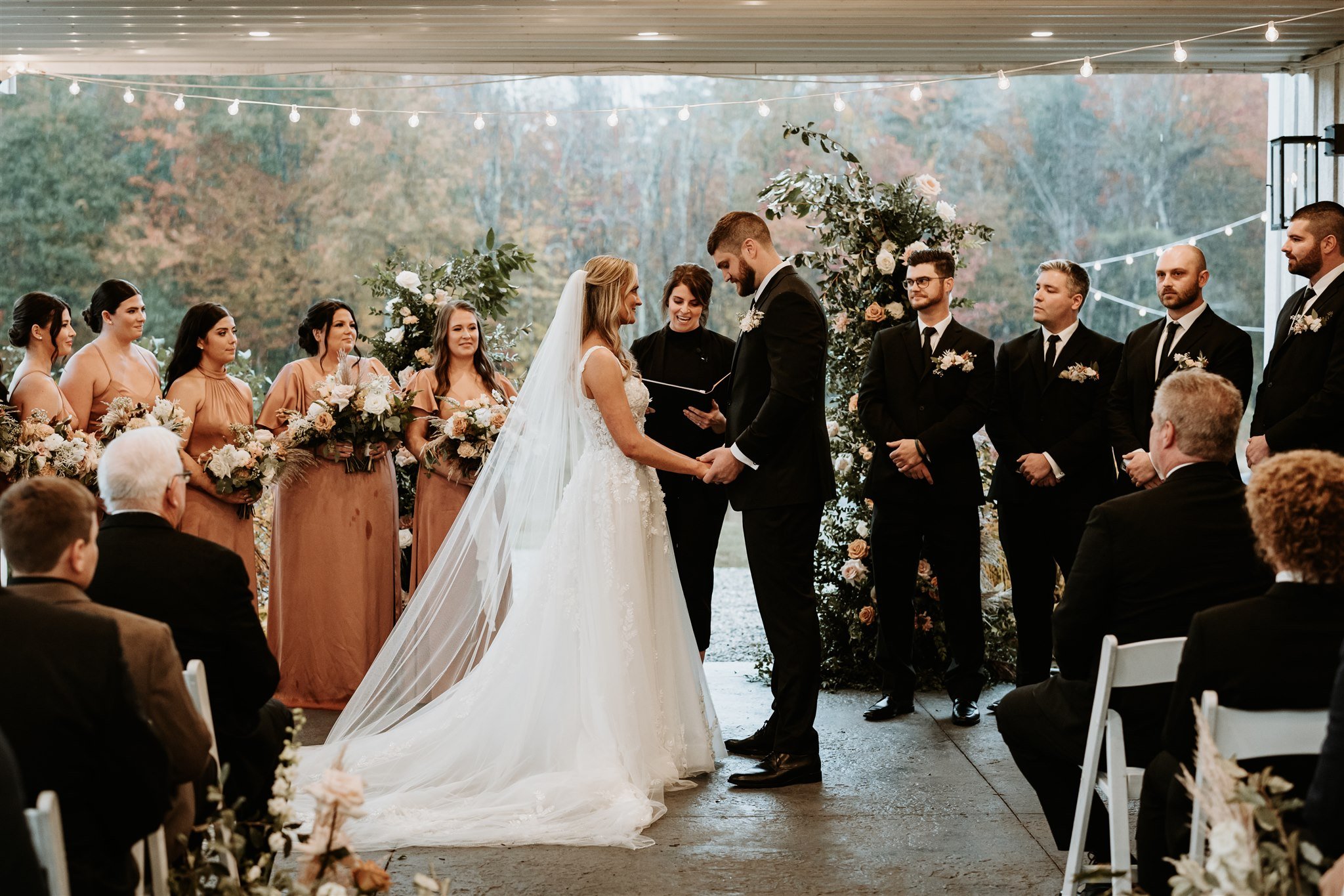 Wedding officiant officiating a custom ceremony at The Greenery at McKenzie’s Farm in Milton, New Hampshire