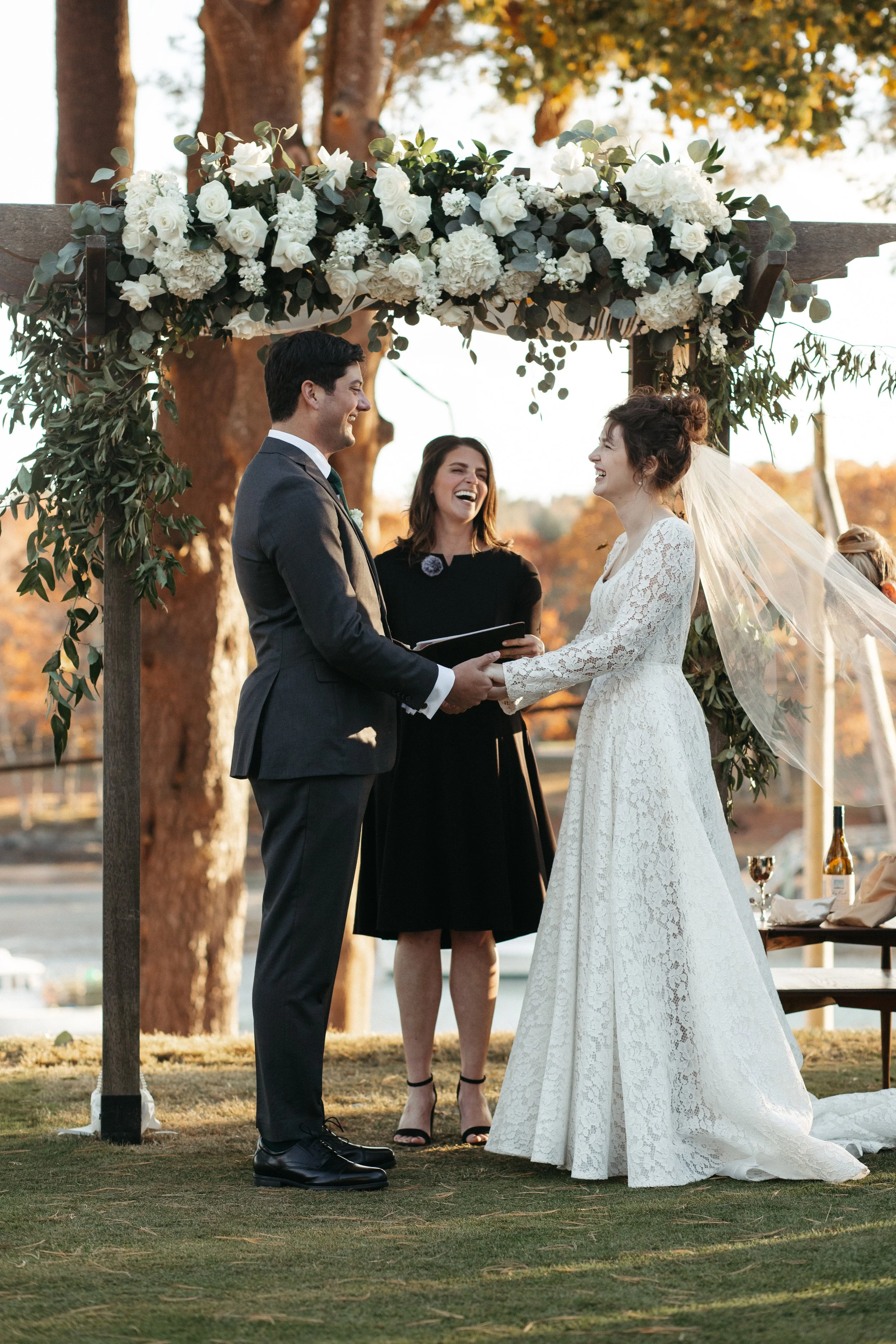 Couple exchanging vows during a culturally blended wedding ceremony in York, Maine, officiated with personalized traditions