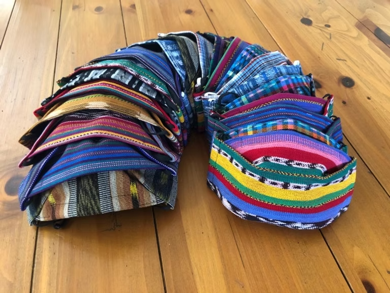 Mask-making initiative raises thousands for impoverished Maya