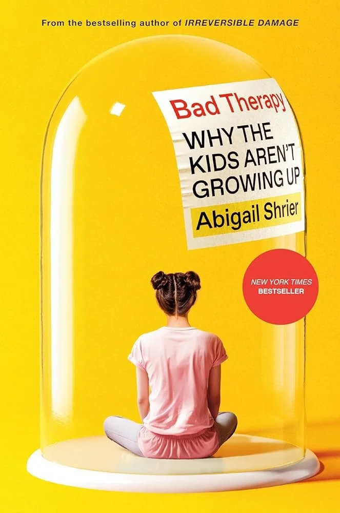 Cover of the book 'Bad Therapy: Why the Kids Aren't Growing Up' by Abigail Shrier, featuring a girl sitting cross-legged inside a glass dome against a yellow background.