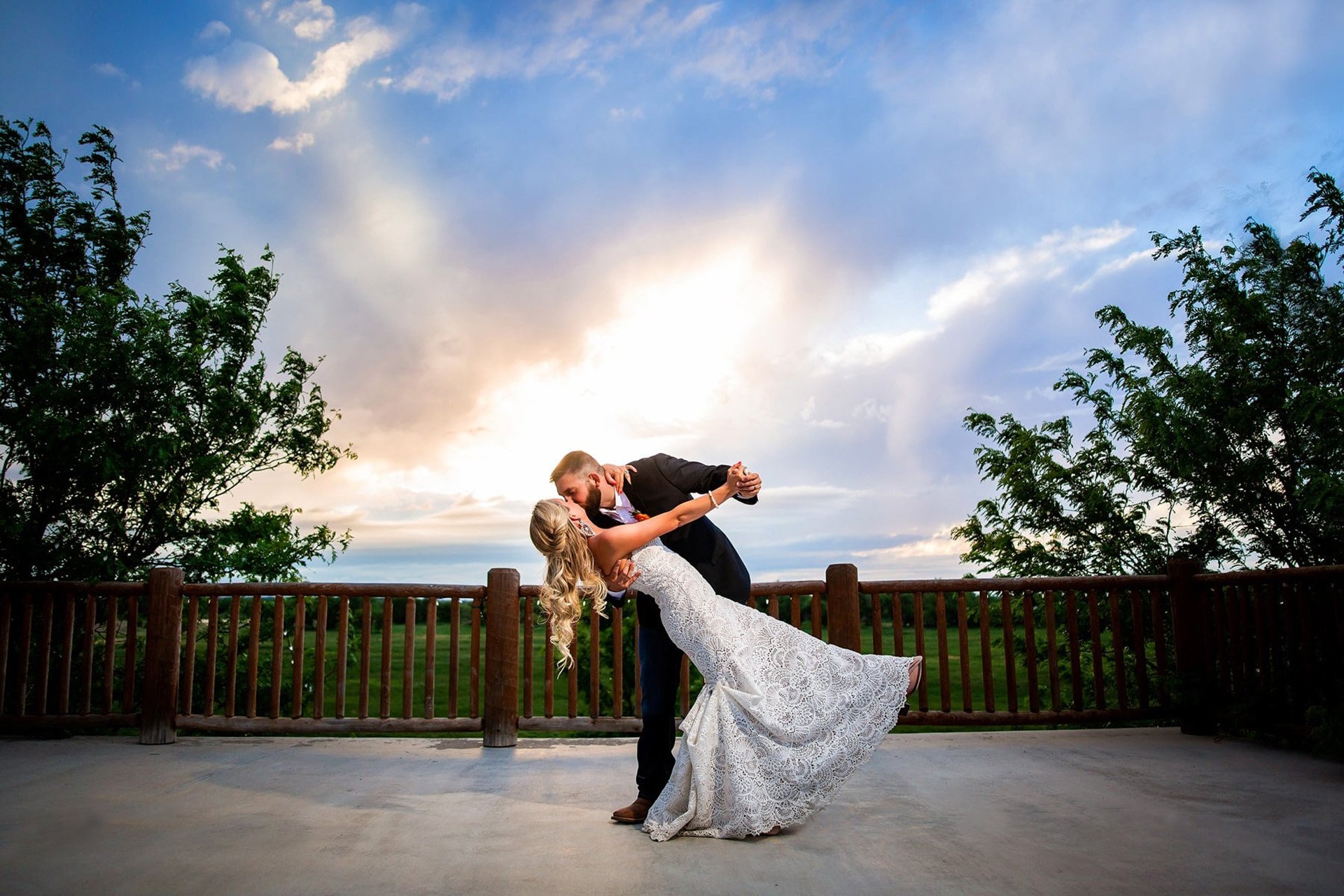 RFR_Weddings_Bride_and_Groom_Dip_Kiss_Sunset_Upper_Patio_-_PhotoCredit_-_Sarah_Gof_Photography.jpg
