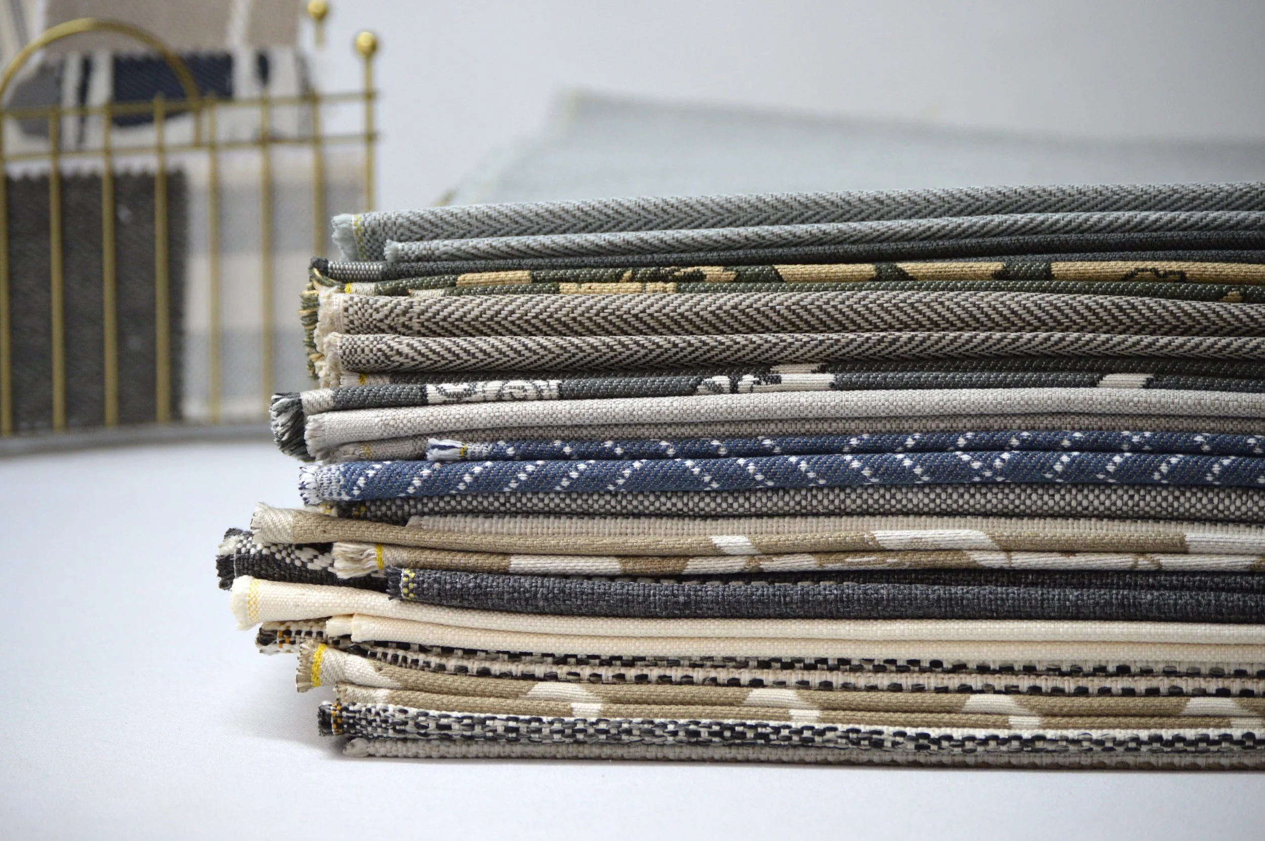 stack of fabrics in studio