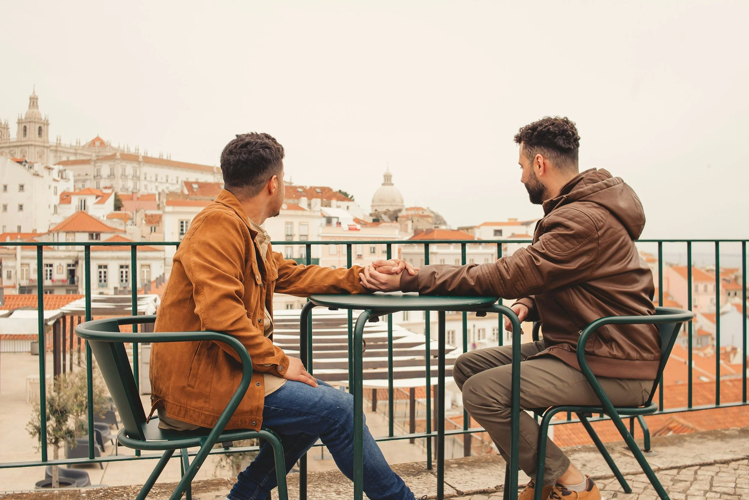 Gay couple working on communication in couples therapy with Megan Bathen-Gonzalez