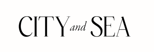 Text reading "CITY and SEA" in black font on a white background.