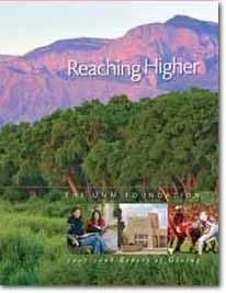 Cover of "Reaching Higher" annual report by UNM Foundation featuring a scenic landscape with mountains and trees.