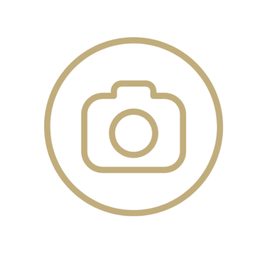 Placeholder icon of a camera inside a circle, indicating an image or photo is not available.