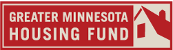 Logo for Greater Minnesota Housing Fund with red background, white text, and an illustration of a house with a chimney.