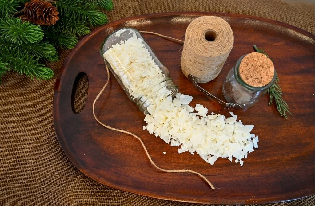 soy wax, twine and jar on a wooden board on burlap, Rustic Rhythm Candle Co. ingredients