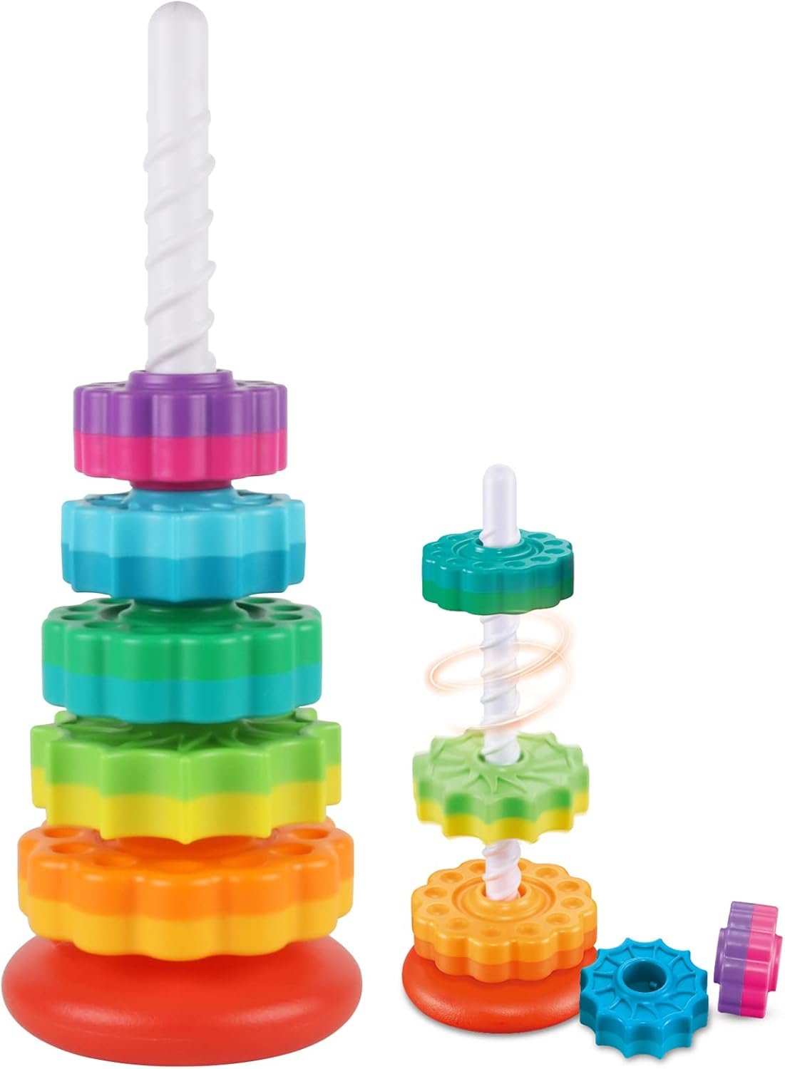 Colorful stacking ring toy with two vertical poles, one tall with a spiral stick and the other shorter, with various plastic rings in purple, pink, blue, green, orange, and red stacked or placed nearby.
