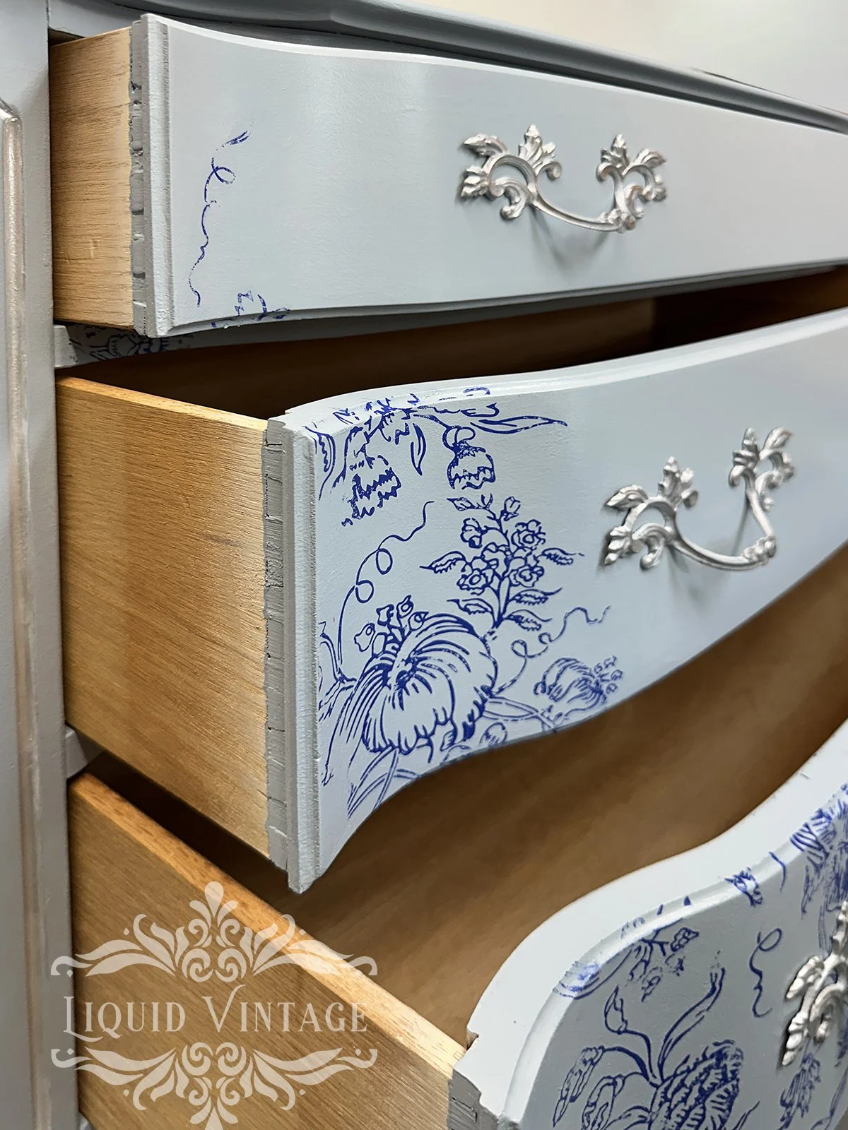 Blue French Provincial open drawers.jpg