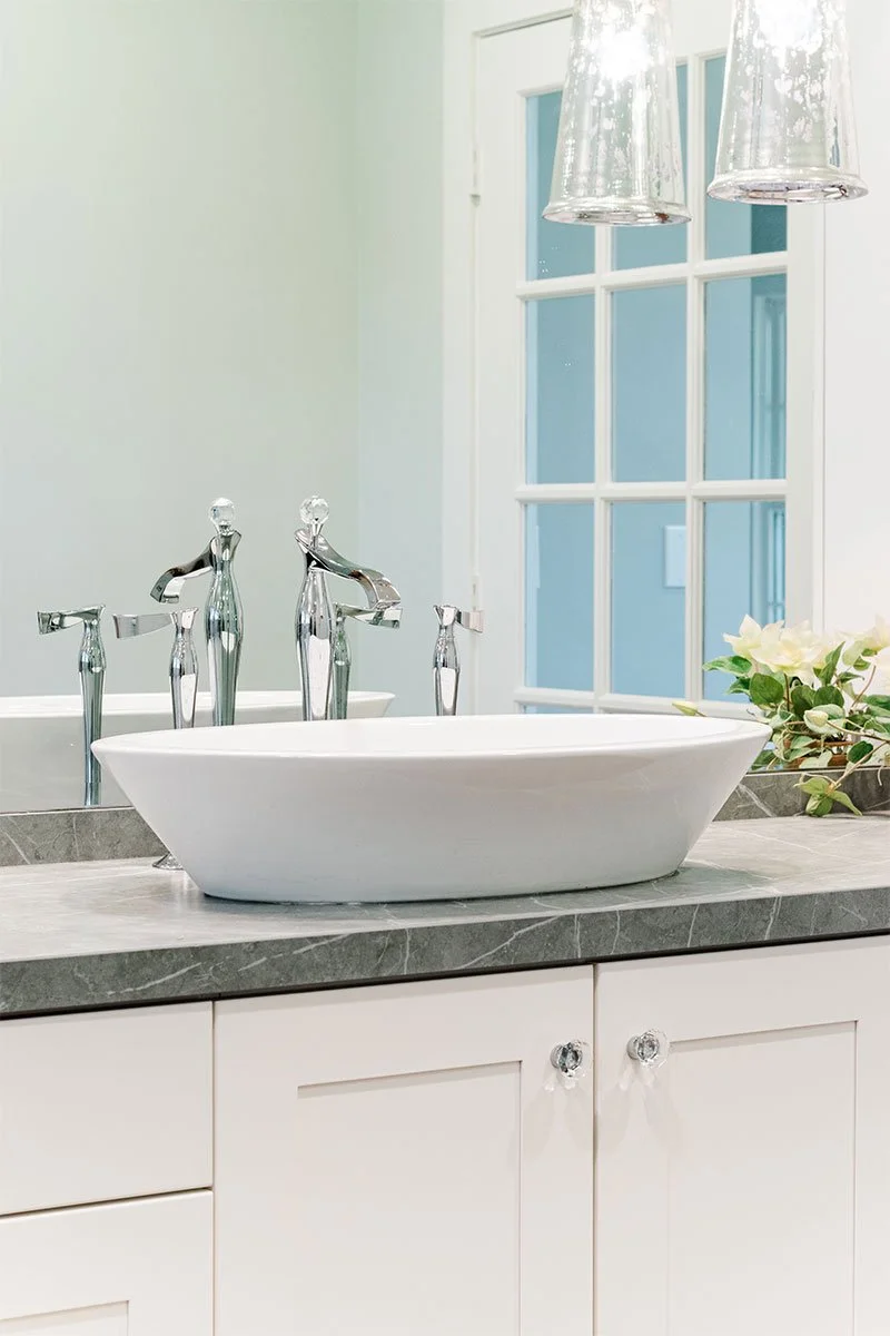A custom bathroom countertop and vanity designed by Michele Dutra