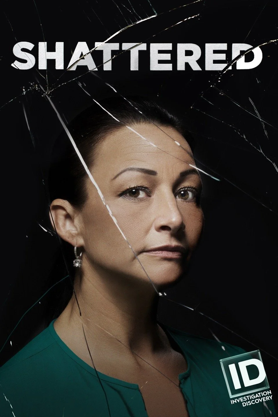 A woman with dark hair and light complexion looks into the camera. She wears a teal top and earrings. The image appears shattered, with cracks radiating across the picture. The word "SHATTERED" is at the top, and a logo with "ID" and the words "Inves