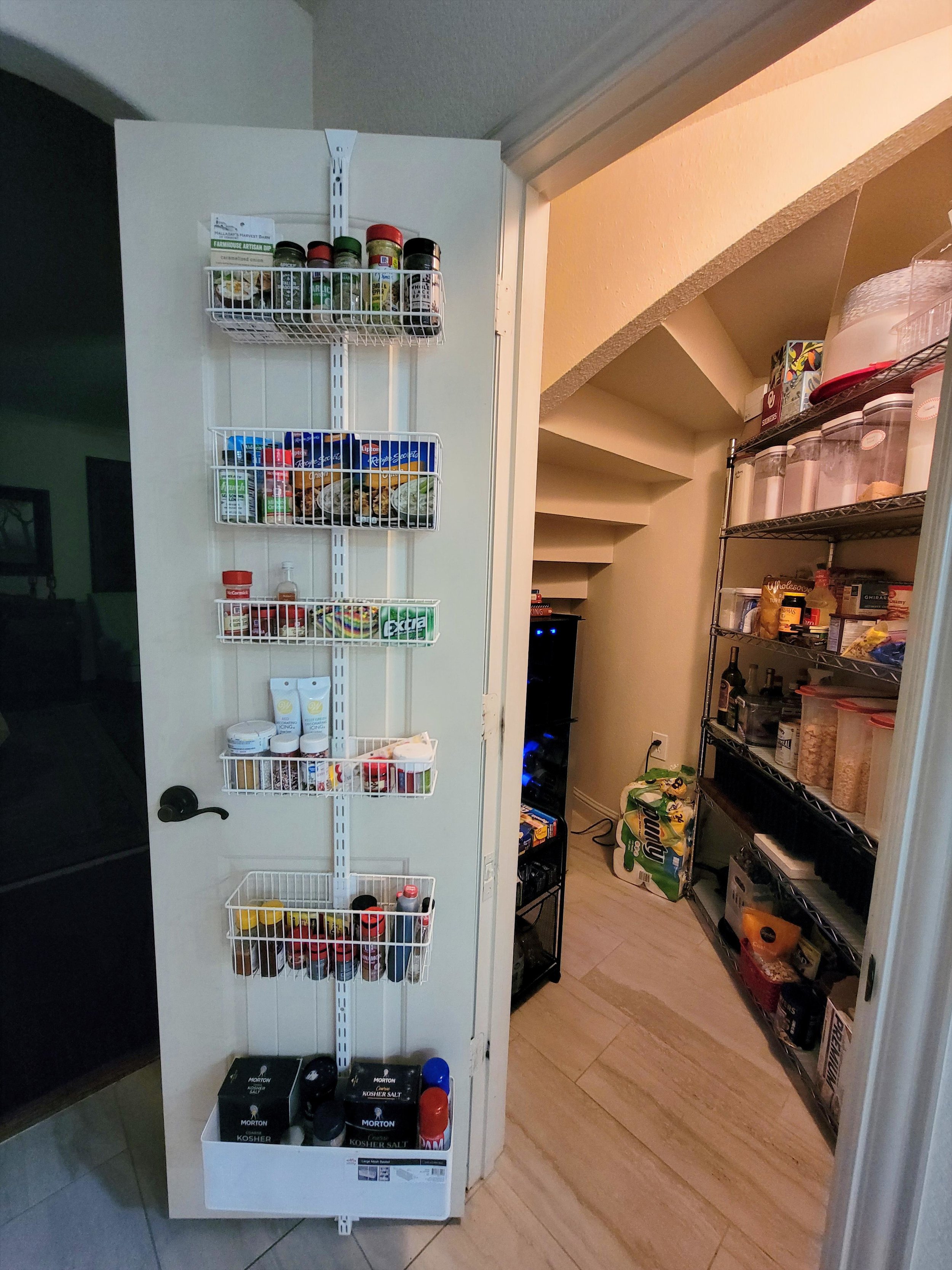 Organized under the stairs closet turned into pantry.