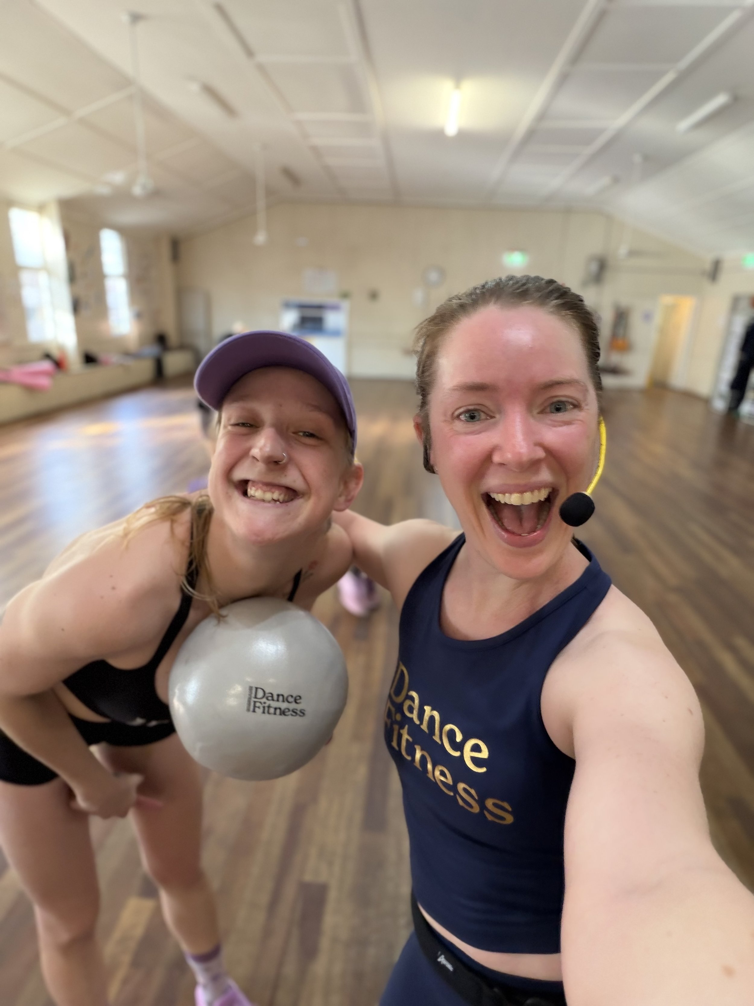 Two young women smiling taking a selfie