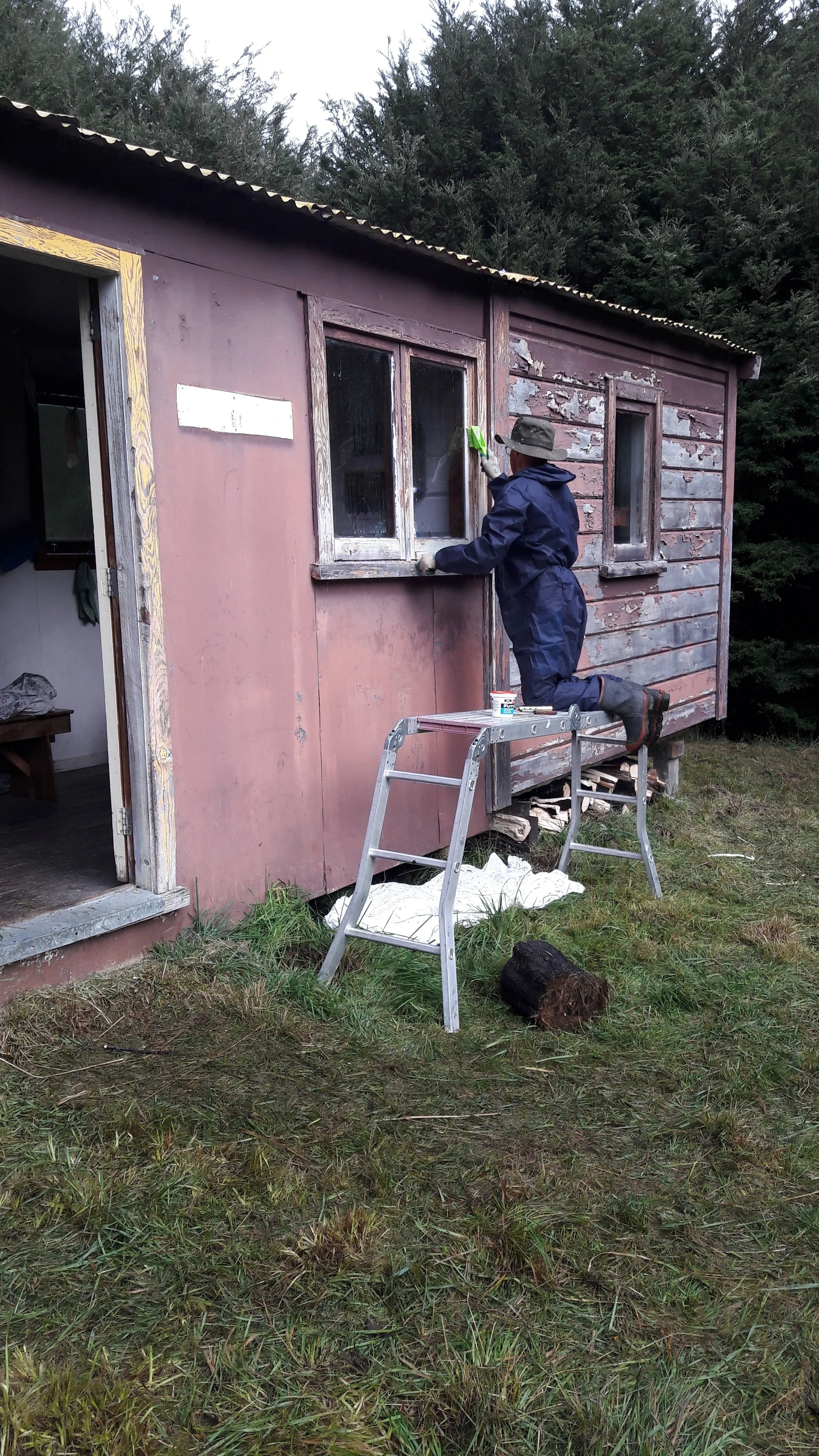 16 April - Rodney preparing window frame ready to putty.jpg