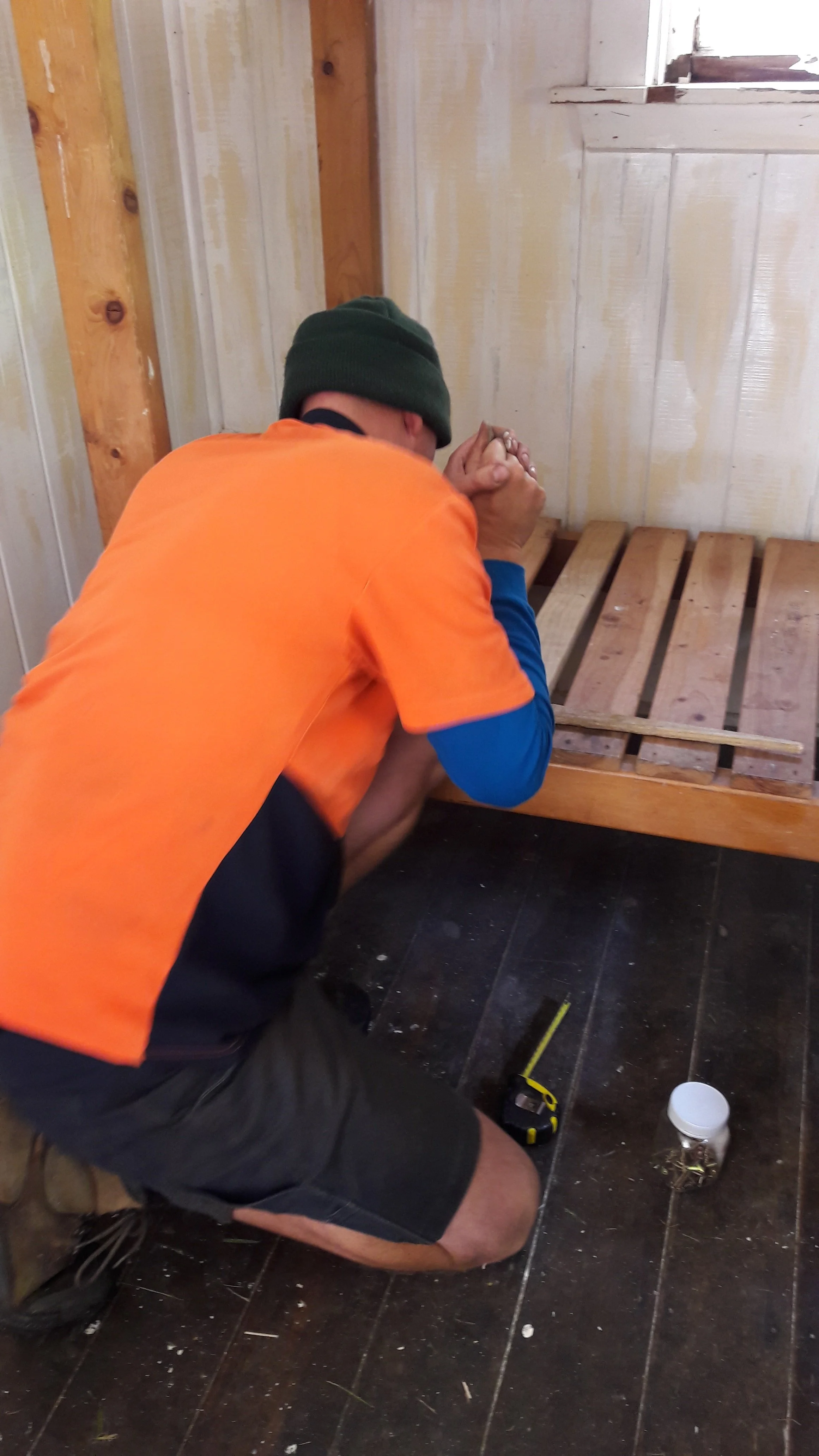 15 April - Aron fixing slats on bunk.jpg