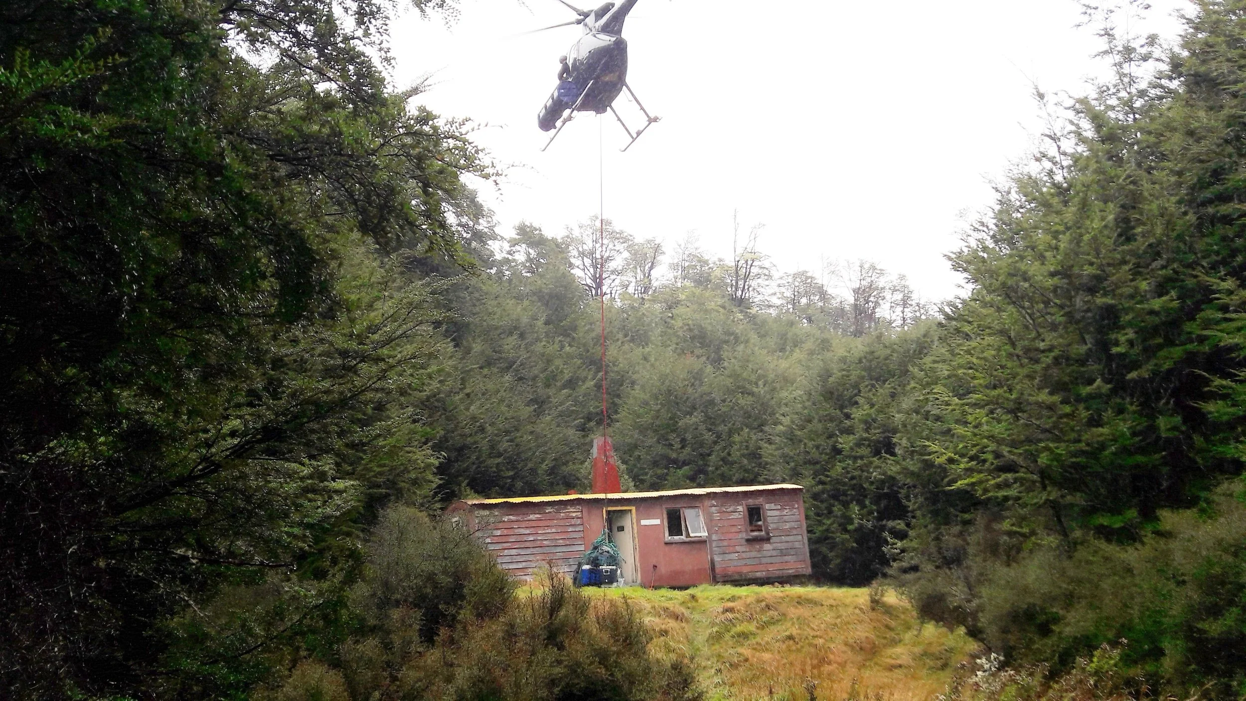 14 April - 2nd swingload being dropped at hut.jpg