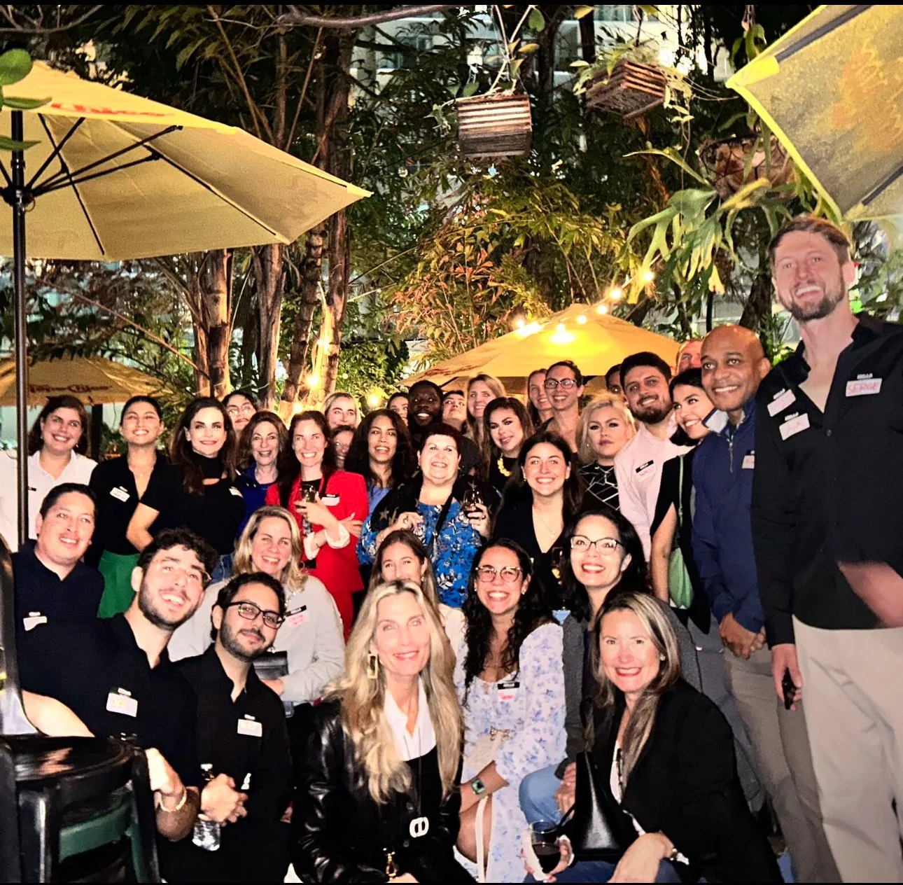 HR professionals networking at an HR Amplified happy hour in Miami