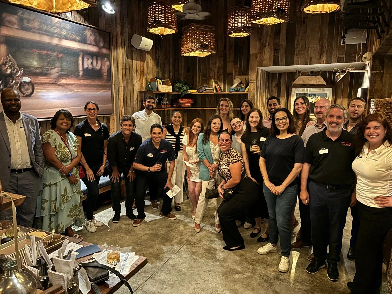 HR professionals networking at an HR Amplified happy hour in Miami