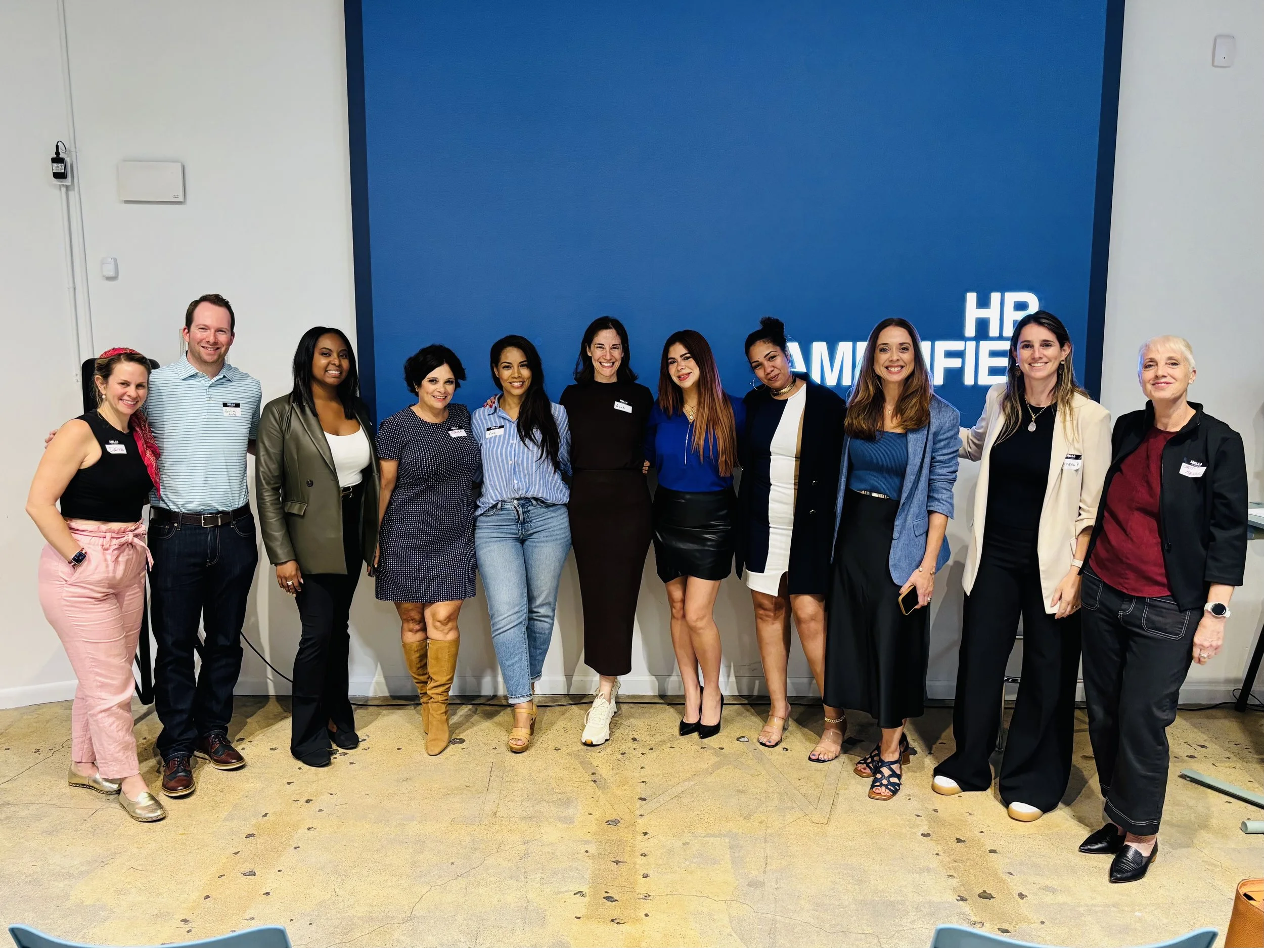 Small group discussion among HR and People Ops professionals at HR Amplified in Miami