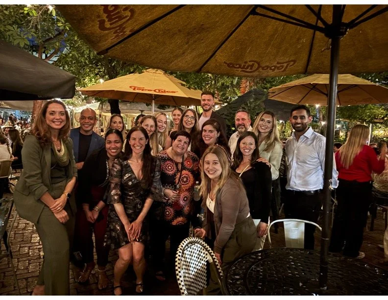 HR professionals networking at an HR Amplified happy hour in Miami
