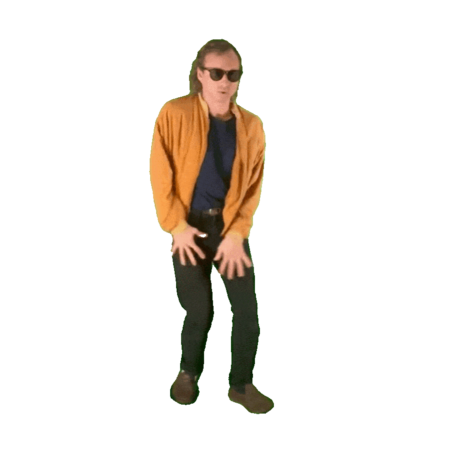 Muunjuun dancing wearing sunglasses, an orange jacket, black pants, and brown shoes, standing against a green background.