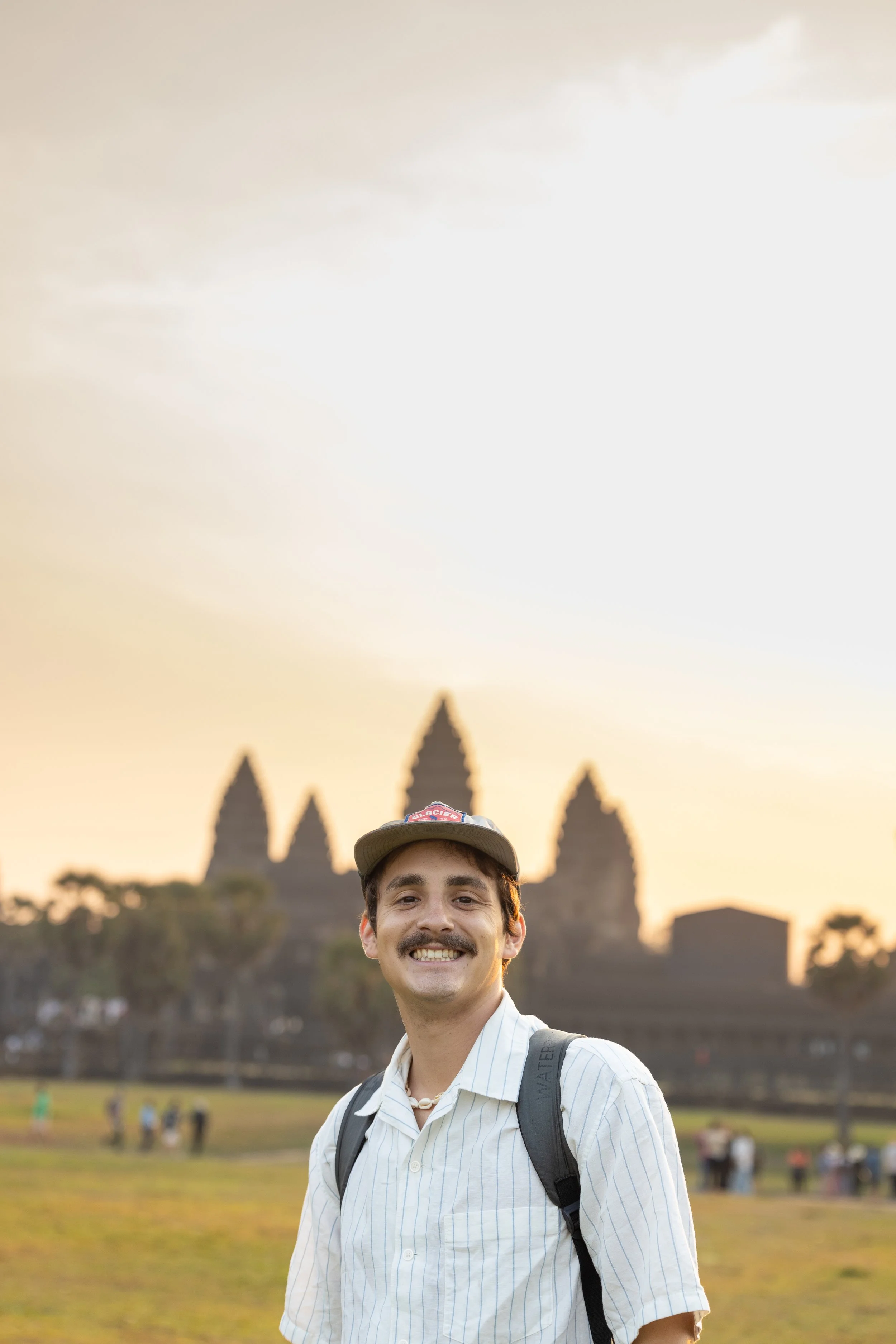 Sebastian in front of Angkor Wat at sunrise.