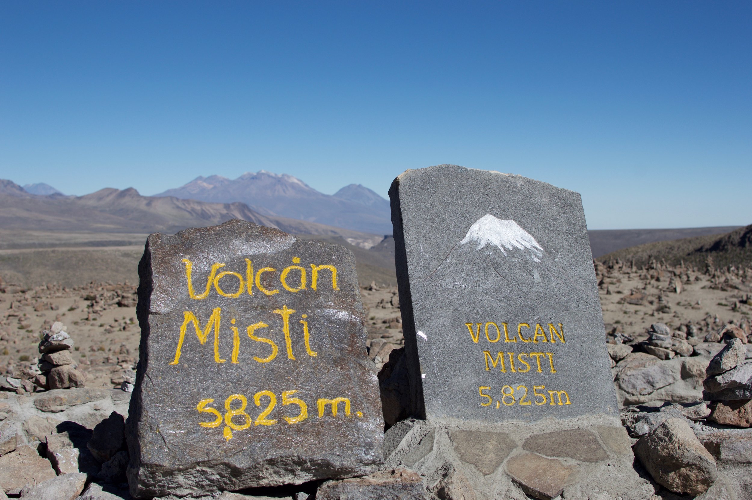 Stone markers at Volcán Misti in Peru showing the volcano’s elevation of 5,825 meters