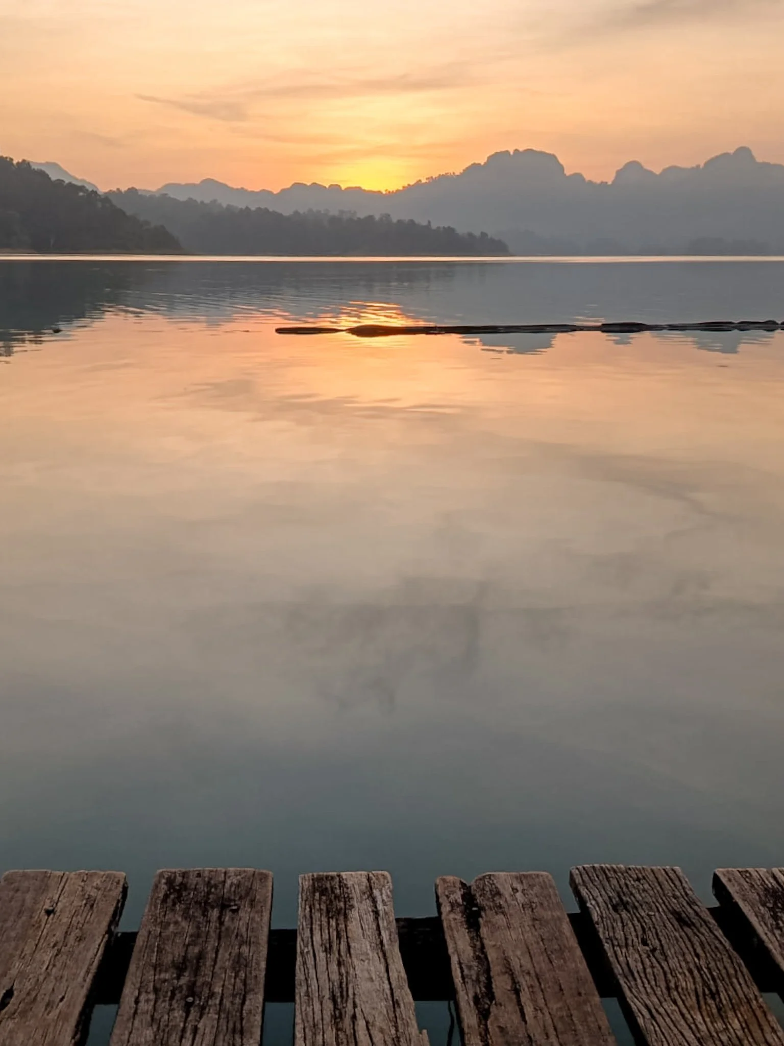 Slow mornings after a sunrise in the waters of Khao Sok, Tahiland.