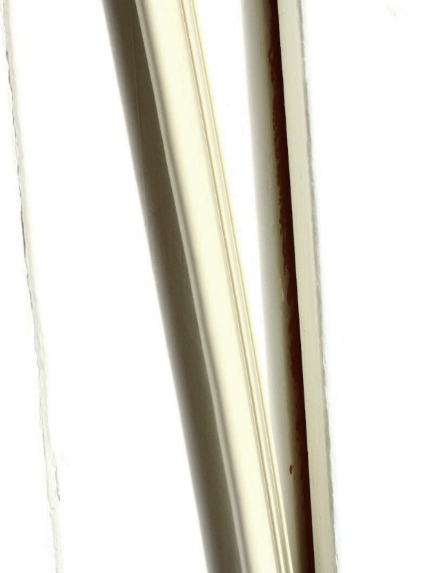 Close-up of window trim and frame with a slight tilt.