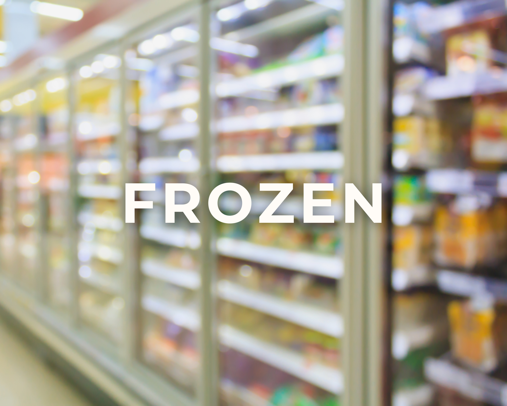Blurred image of frozen food section in grocery store with a sign labeled 'FROZEN' in the center.