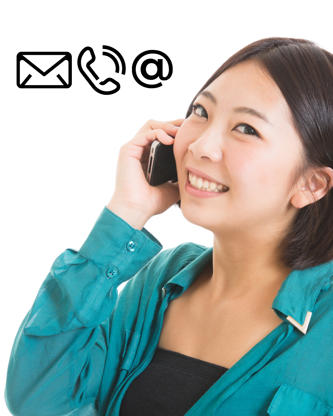 Young woman with short dark hair smiling while talking on a cell phone, wearing a teal shirt and black top