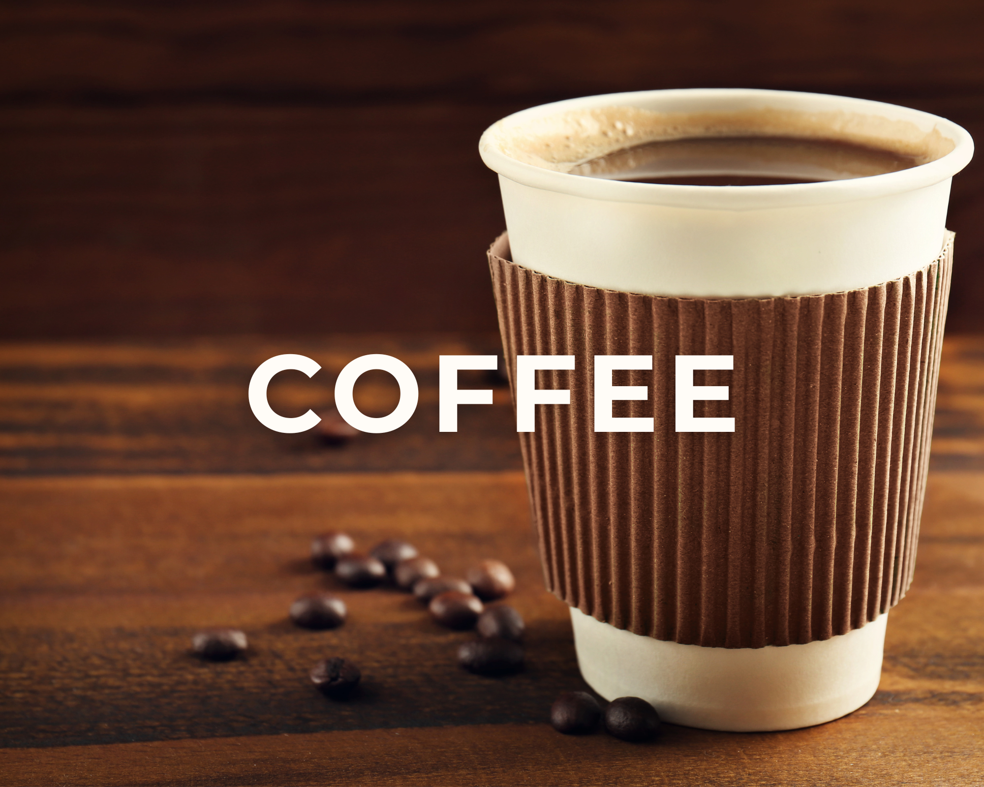 A paper coffee cup with a corrugated sleeve, filled with black coffee, on a wooden surface with scattered coffee beans, with the word 'COFFEE' overlaid.