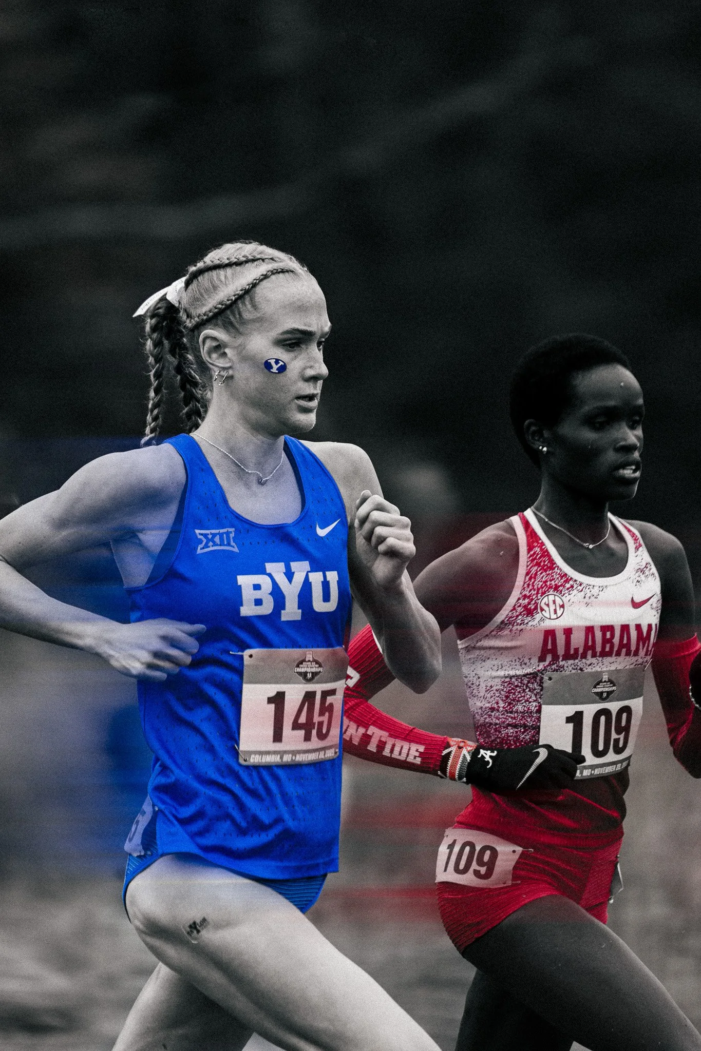 Two female athletes running in a race, one in a blue BYU uniform and the other in a red Alabama uniform.