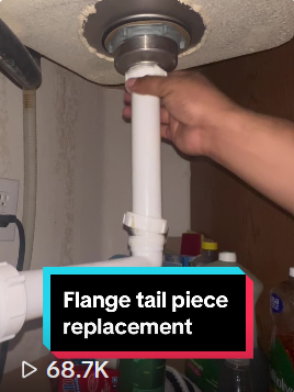 Licensed plumber replacing a clogged kitchen sink drain and flange tail piece unit during a residential service call in Mesquite.