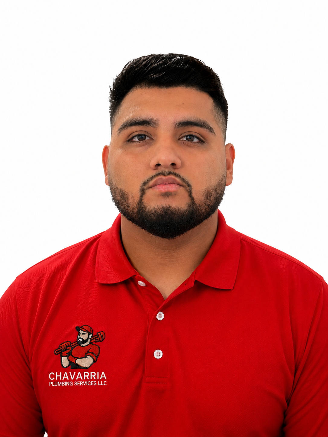 Seth, a licensed Registered Master Plumber and owner of Chavarria Plumbing Services in Mesquite, TX, wearing his professional red company uniform.