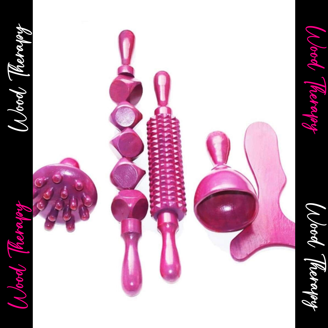 Set of four pink massage tools and accessories, including a textured roller, silicone massagers, and a flat wand.