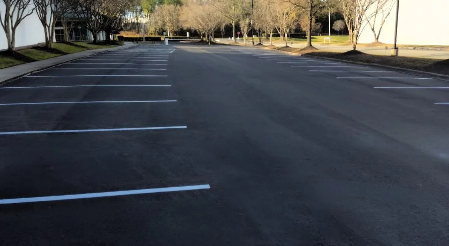 New line striping applied over a fresh seal coat