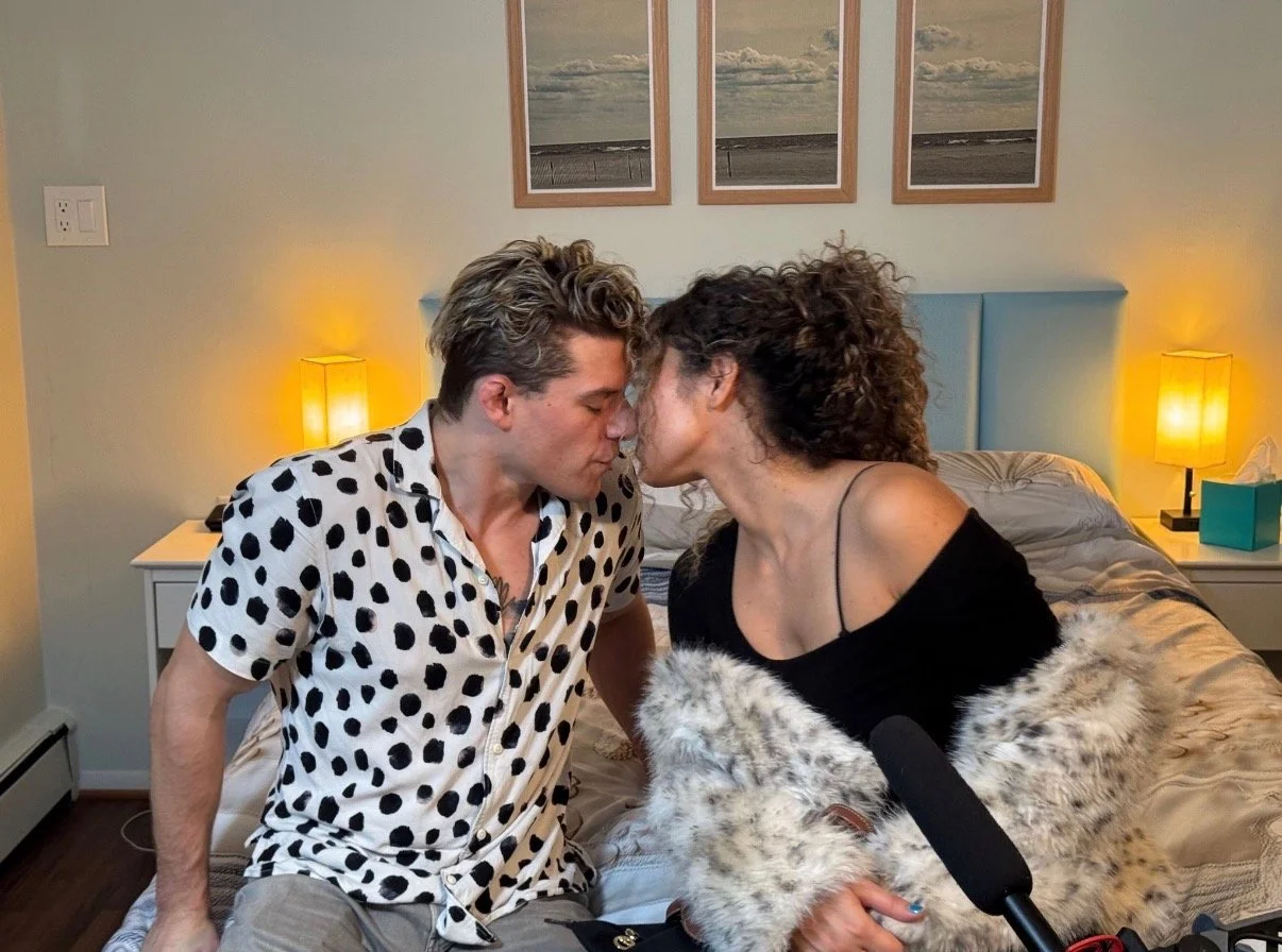 Travis acting about to kiss a woman