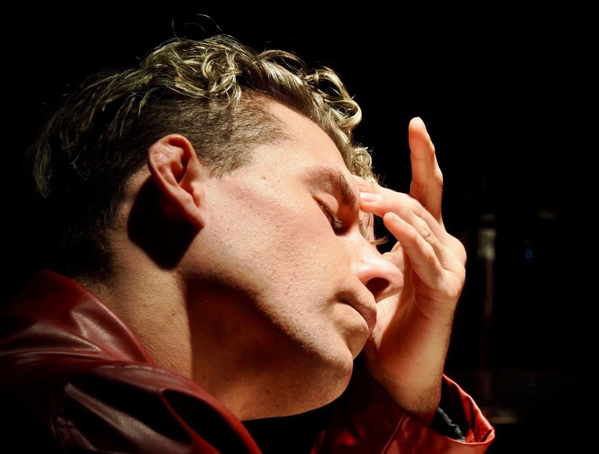 Travis Grant BTS portraying exasperation