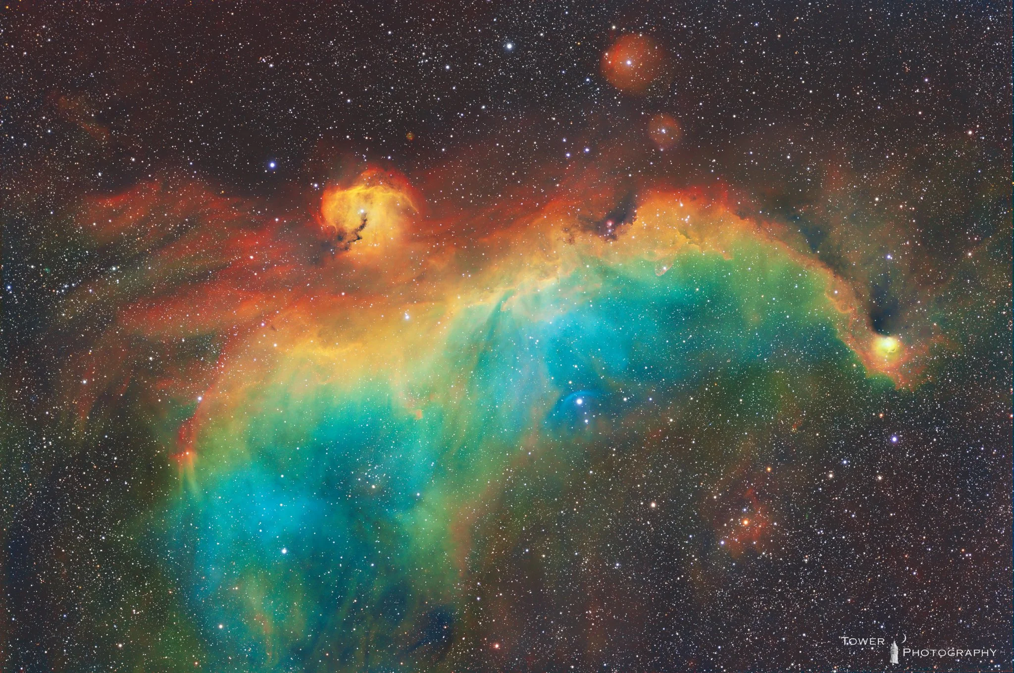 Colorful nebula with bright stars against a dark space background.