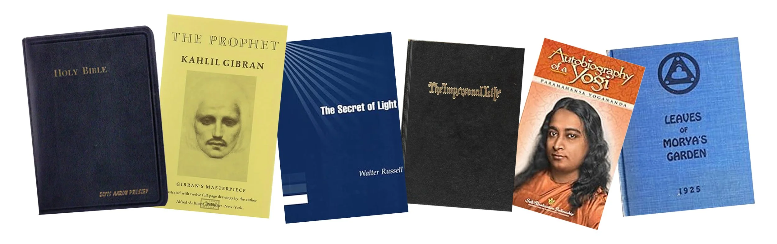 Books from Elvis Presley's Library , including religious and philosophical titles, arranged in a row.