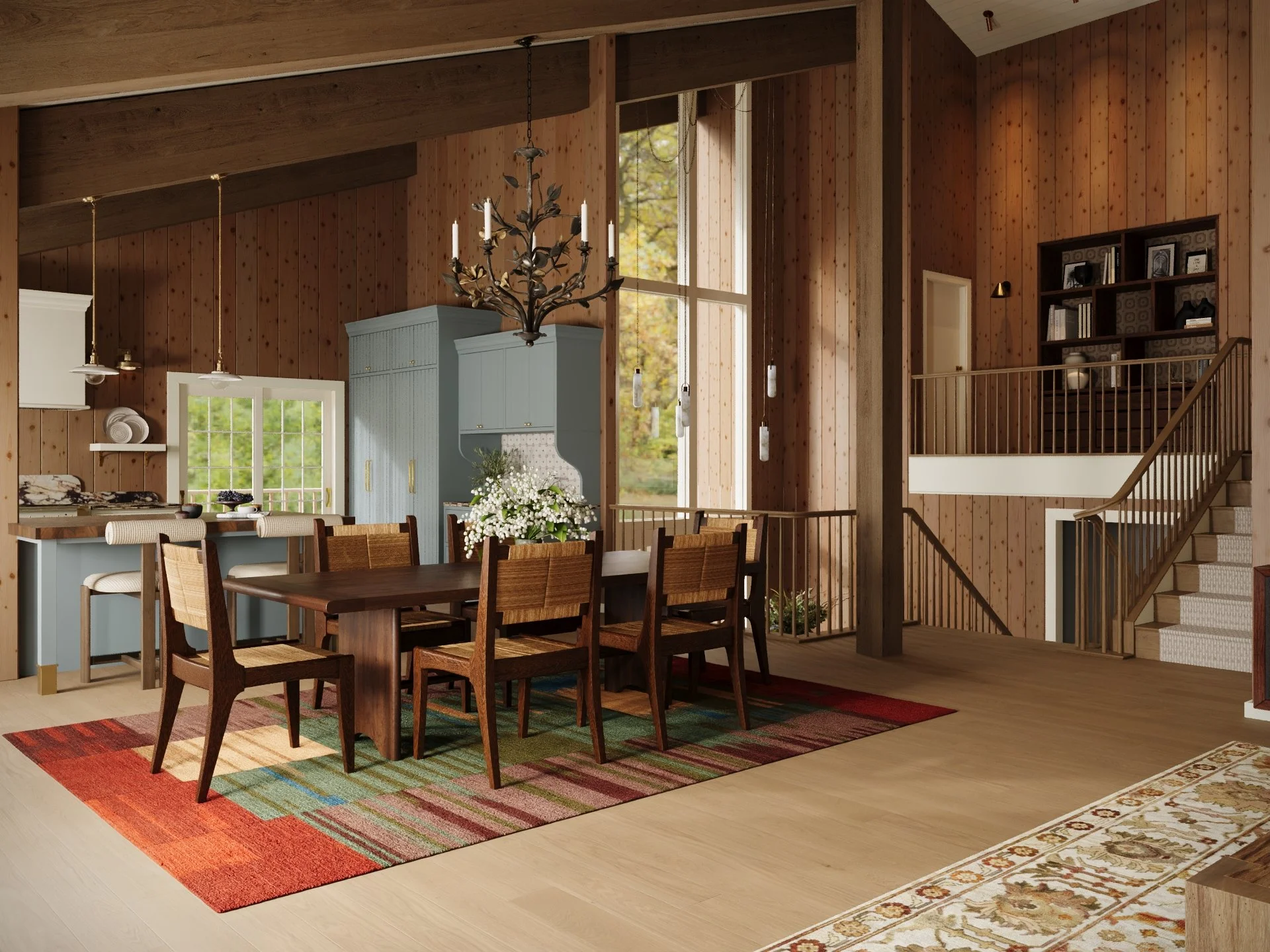 Modern kitchen with white cabinets, gold fixtures, and two windows letting in natural light.