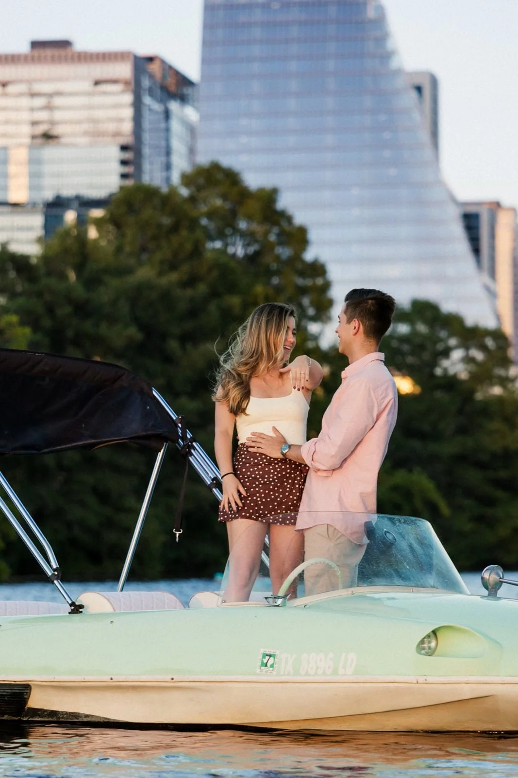 A couple got engaged at lake travis on a boat