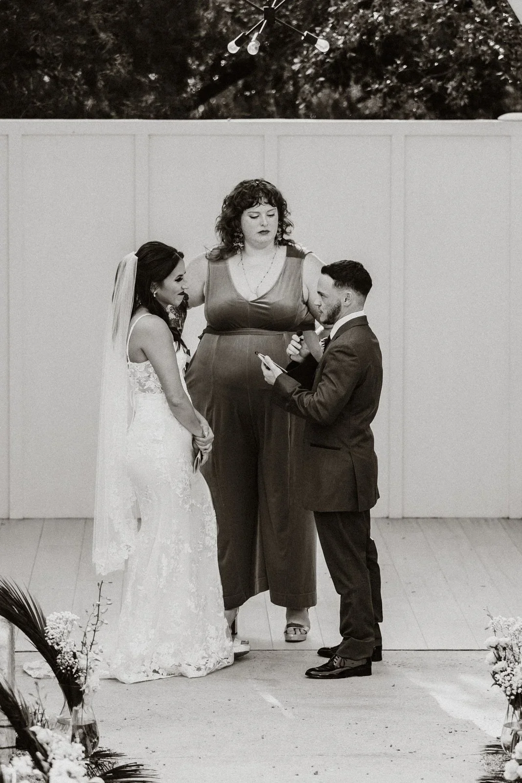 groom reading ceremony vows at Austin elopement ceremony