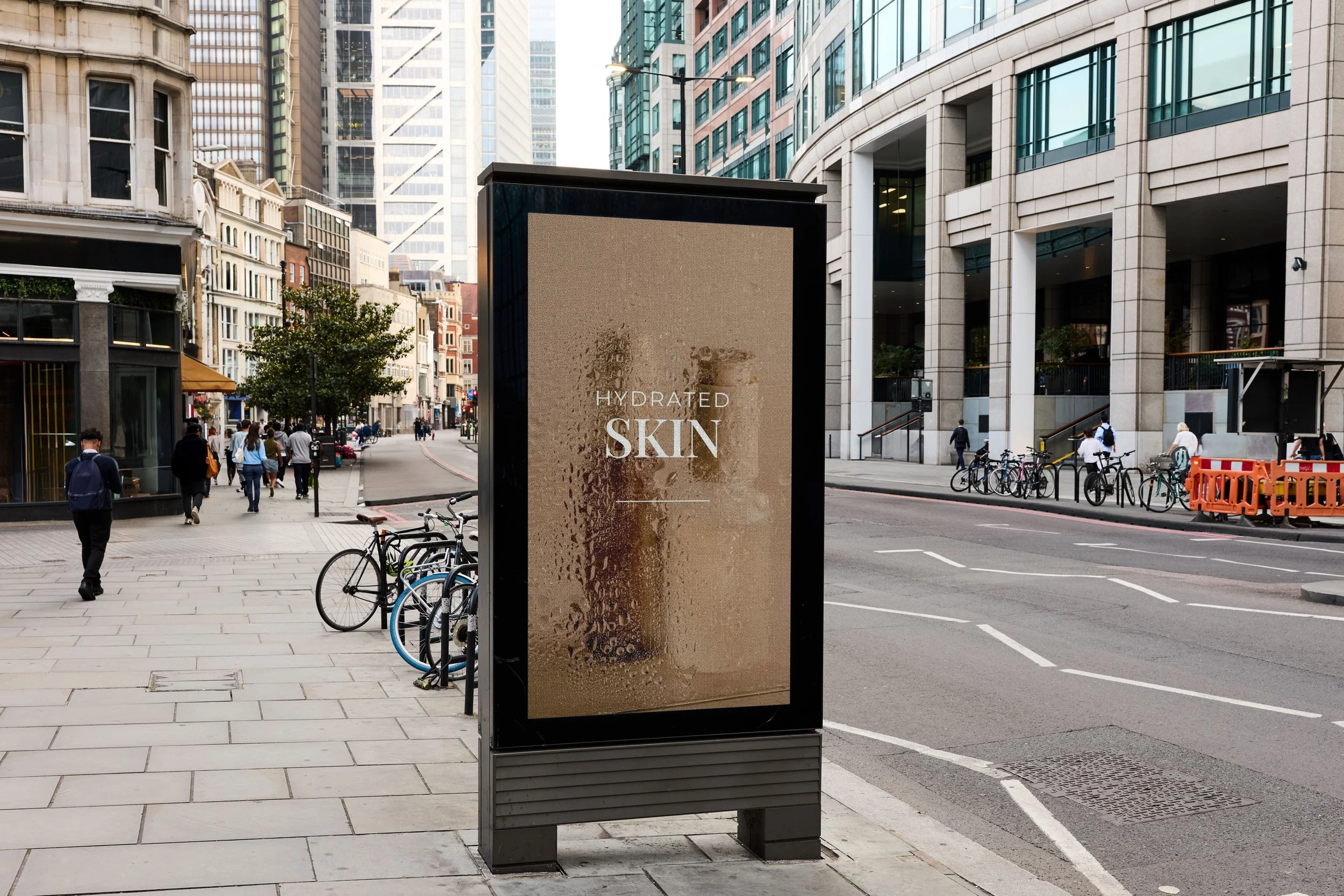 beauty and cosmetic outside billboard standing street city scene with skyscraper buildings daylight bicycles