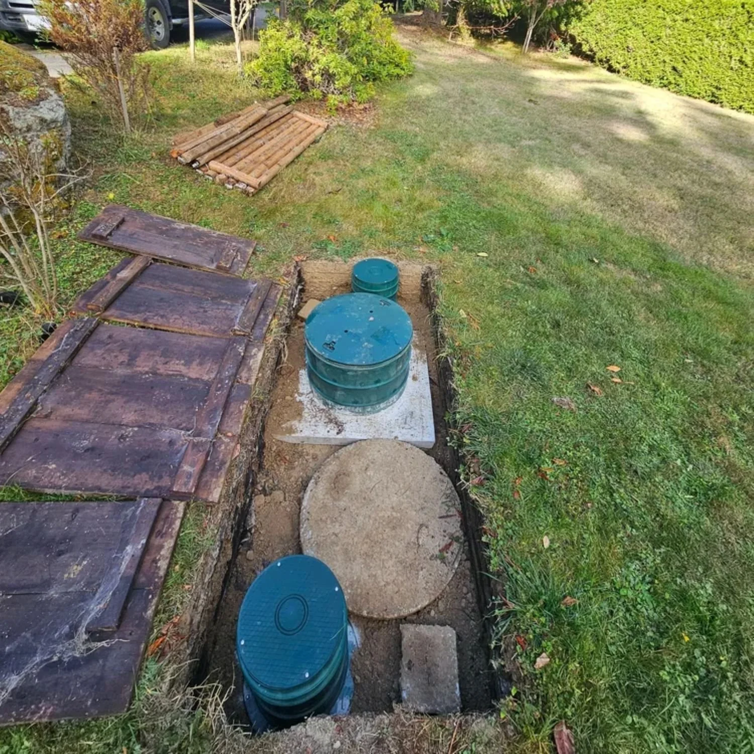 Septic tank lids with new risers installed